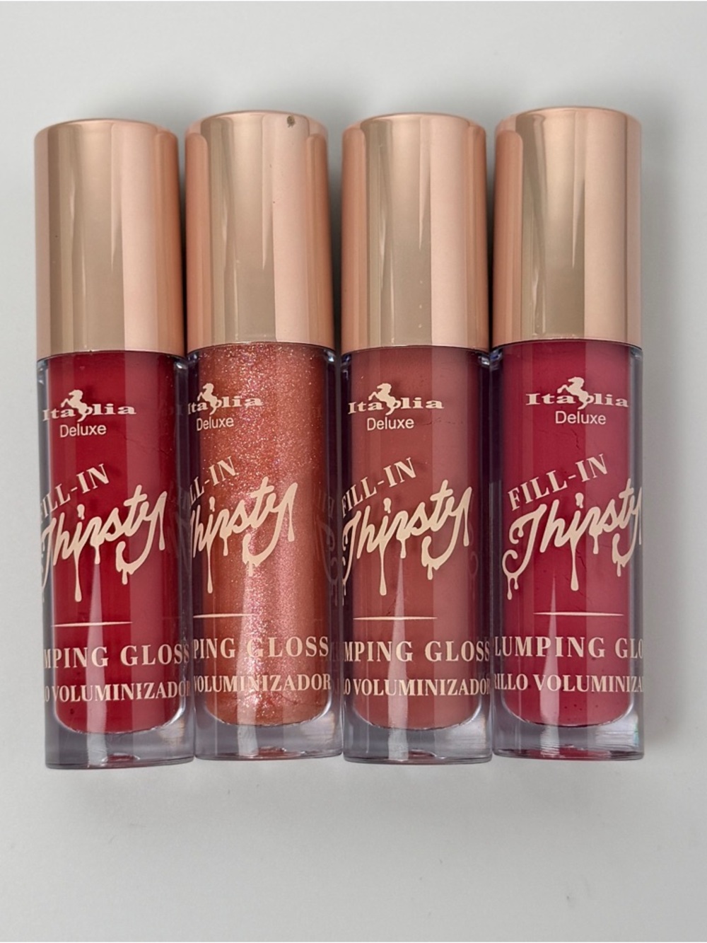 Fill-In Thirsty Plumping Lip Gloss 4 pc  - Dolly, lover, cutie, modest